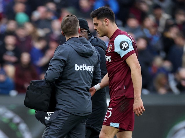 West Ham United's Konstantinos Mavropanos receives medical attention after sustaining an injury on January 7, 2024