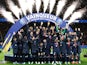 Paris Saint-Germain (PSG) players celebrate winning the Trophee des Champions with the trophy on January 3, 2024