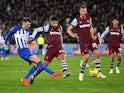 Brighton & Hove Albion's Pascal Gross in action with West Ham United's Emerson Palmieri on January 2, 2024