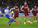 Brighton & Hove Albion's Pascal Gross in action with West Ham United's Emerson Palmieri on January 2, 2024