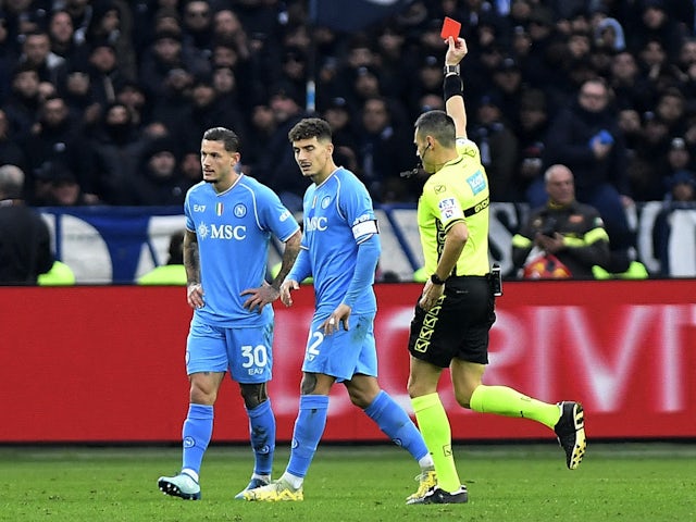Napoli's Pasquale Mazzocchi is shown a red card by referee Maurizio Mariani on January 7, 2024
