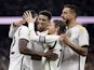 Real Madrid's Antonio Rudiger celebrates scoring their first goal with teammates on January 3, 2024