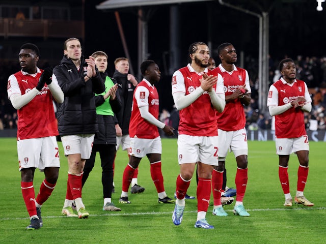 Rotherham United players applaud fans after the match on January 5, 2024