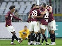 Torino's Alessandro Buongiorno celebrates scoring their third goal with teammates on January 7, 2024