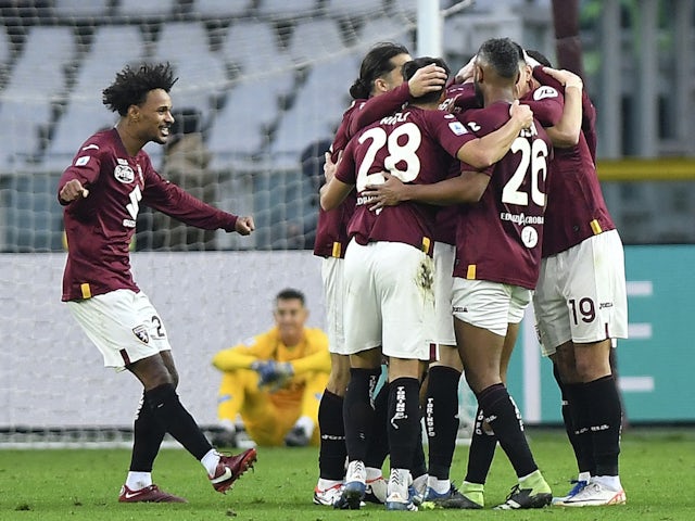 Torino's Alessandro Buongiorno celebrates scoring their third goal with teammates on January 7, 2024