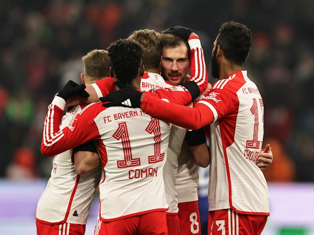 Bayern Munich's Harry Kane celebrates scoring their third goal with Leon Goretzka, Kingsley Coman and Eric Maxim Choupo-Moting on January 12, 2024