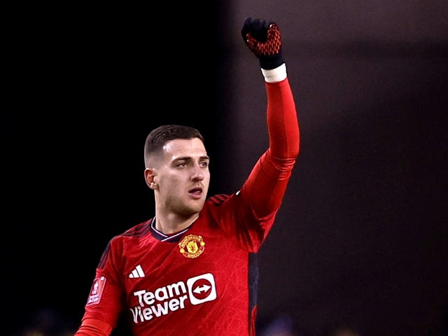 Manchester United's Diogo Dalot celebrates scoring their first goal on January 8, 2024