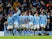 Manchester City players celebrate scoring their fifth goal on January 7, 2024