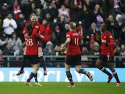 Manchester United Women's Rachel Williams celebrates scoring their fourth goal with Irene Guerrero, Leah Galton and Melvine Malard on January 14, 2024