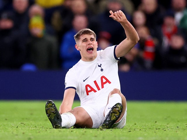 Tottenham Hotspur's Micky van de Ven reacts after sustaining an injury on January 14, 2024