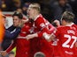 Middlesbrough's Hayden Hackney celebrates scoring their first goal with teammates on January 9, 2024