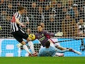 Newcastle United's Sean Longstaff scores a disallowed goal as Manchester City's Ederson and Kyle Walker collide on January 13, 2024