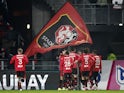 Rennes' Arnaud Kalimuendo celebrates scoring their second goal with teammates on January 13, 2024