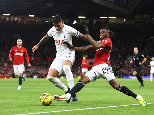 Tottenham Hotspur's Cristian Romero in action with Manchester United's Aaron Wan-Bissaka on January 14, 2024