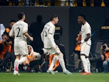 Real Madrid's Vinicius Junior celebrates scoring their first goal with Federico Valverde and Dani Carvajal on January 14, 2024