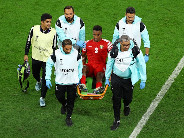 Jordan's Abdallah Nasib is stretchered off after sustaining an injury on January 15, 2024