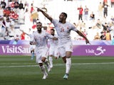 Bahrain's Abdullah Al Hashash celebrates scoring their first goal with teammates on January 15, 2024