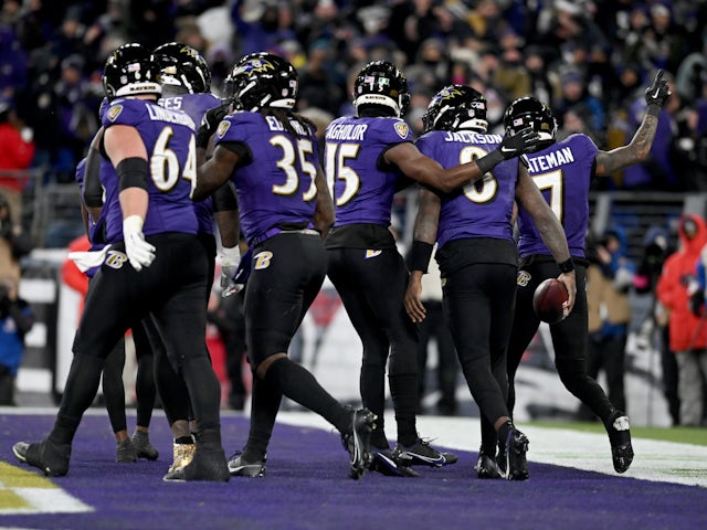 Baltimore Ravens quarterback Lamar Jackson (8) celebrates with teammates after scoring a touchdown on January 20, 2024
