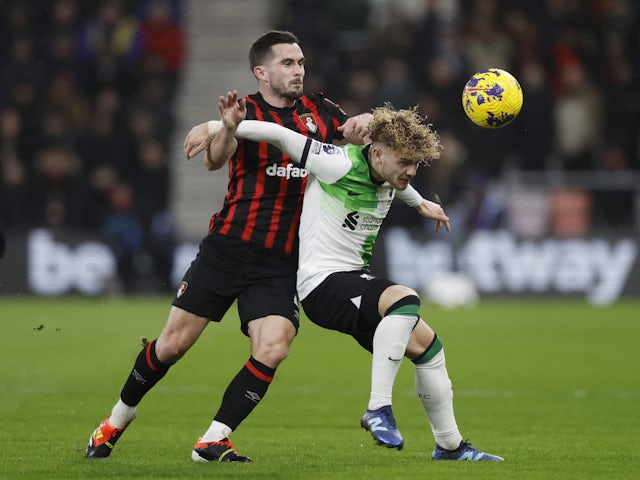 Bournemouth's Lewis Cook in action with Liverpool's Harvey Elliott on January 21, 2024