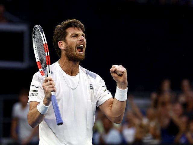 Britain's Cameron Norrie celebrates after winning his third round match against Norway's Casper Ruud on January 20, 2024