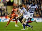 Luton Town's Cauley Woodrow in action with Reading's Tom Holmes on April 19, 2023