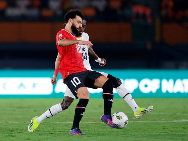 Egypt's Mohamed Salah in action with Ghana's Gideon Mensah on January 18, 2024