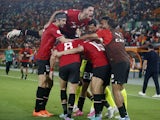 Egypt's Mostafa Mohamed celebrates scoring their second goal with teammates on January 19, 2024