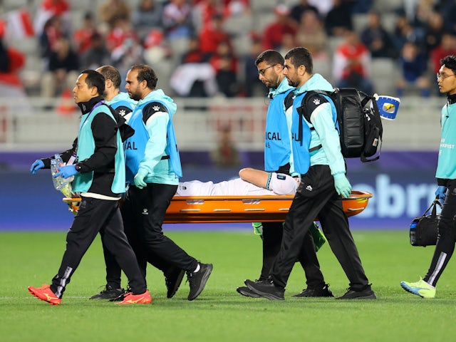 Indonesia's Jordi Amat is stretchered off after sustaining an injury on January 19, 2024