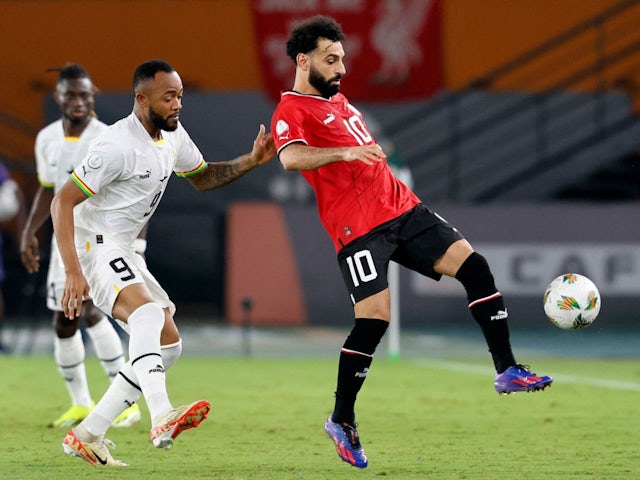 Egypt's Mohamed Salah in action with Ghana's Jordan Ayew on January 18, 2024