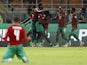 Namibia's Deon Hotto celebrates scoring their first goal with teammates on January 16, 2024