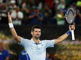 Serbia's Novak Djokovic celebrates after winning his fourth round match against France's Adrian Mannarino on January 21, 2024