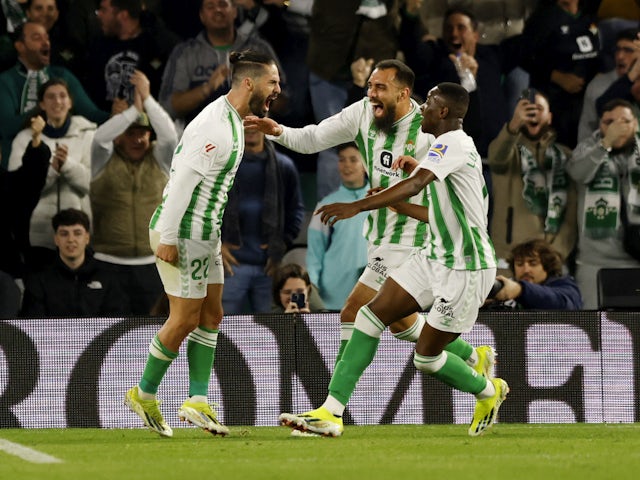 Real Betis' Isco celebrates scoring their second goal with Nabil Fekir and Luiz Henrique on January 21, 2024