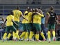 South Africa's players celebrate after Themba Zwane scores their second goal on January 21, 2024
