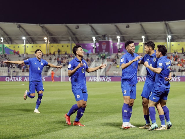 Thailand's Supachai Jaided celebrates scoring their second goal with teammates on January 16, 2024