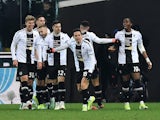 Udinese's Florian Thauvin celebrates scoring their second goal with teammates on January 20, 2024