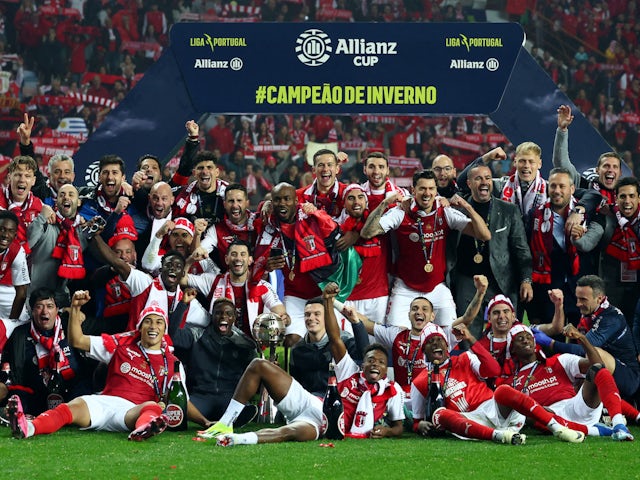 Braga players celebrate with the trophy after winning the Taca da Liga on January 27, 2024