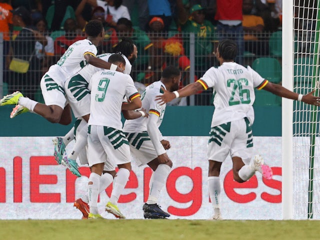 Cameroon's Karl Toko Ekambi celebrates scoring their first goal with teammates on January 23, 2024