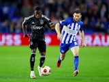  Ajax Amsterdam's Carlos Borges in action with Brighton & Hove Albion's James Milner  on October 26, 2023