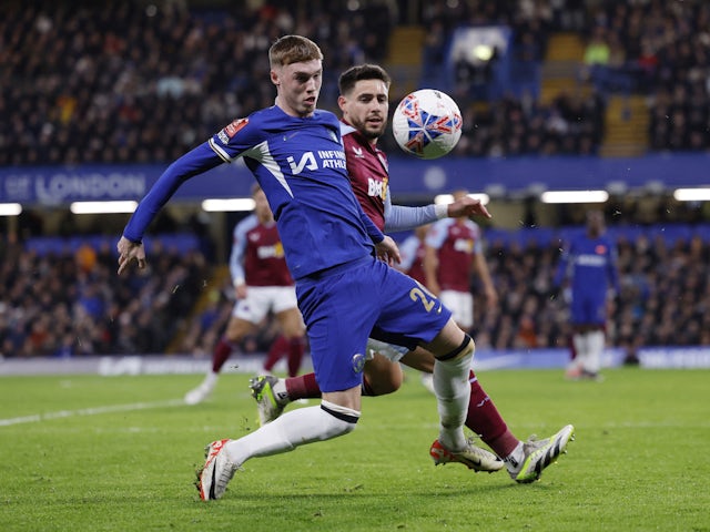 Chelsea's Cole Palmer in action with Aston Villa's Alex Moreno on January 26, 2024