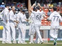 England celebrate a wicket against India on January 28, 2024.