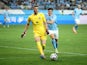 Atletico Madrid's Ivo Grbic in action with Manchester City's Julian Alvarez on July 30, 2023