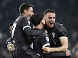 Juventus' Dusan Vlahovic celebrates scoring their first goal with teammates on January 27, 2024