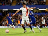 Chelsea's Malo Gusto in action with Luton Town's Ryan Giles on August 25, 2023