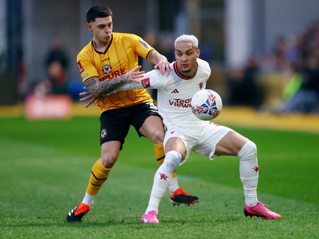 Newport County's Adam Lewis in action with Manchester United's Antony on January 28, 2024