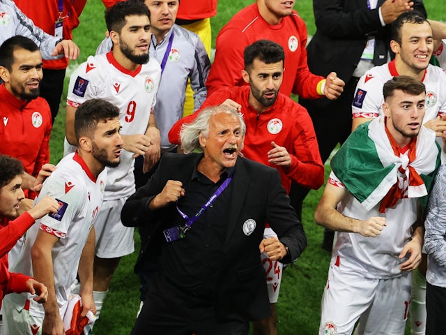 Tajikistan manager Petar Segrt celebrates with his team after their round of 16 victory at the Asian Cup