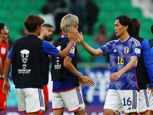 Seiya Maikuma celebrates the victory for Japan at the Asian Cup versus Bahrain