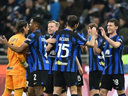 Inter Milan's Benjamin Pavard celebrates with teammates after the match on February 4, 2024
