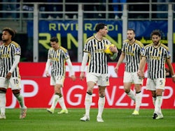 Juventus' Dusan Vlahovic and teammates look dejected after Federico Gatti scores an own goal on February 4, 2024