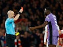 Liverpool's Ibrahima Konate is shown a red card by referee Anthony Taylor on February 4, 2024