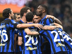 Inter Milan players celebrate after Juventus' Federico Gatti scores an own goal on February 4, 2024